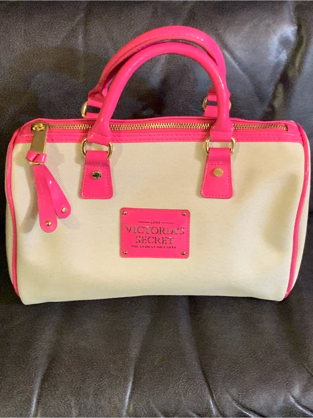 Victoria's Secret Cream Satchel with Hot Pink Trim.features a beige canvas body